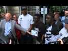 Migrant 'hero' given French residency card after saving child - Label : AFPTV - First images - Category : News