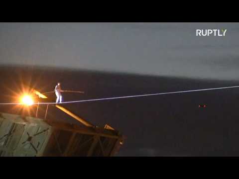 Daredevil amazes St. Petersburg with tightrope walk over Neva River