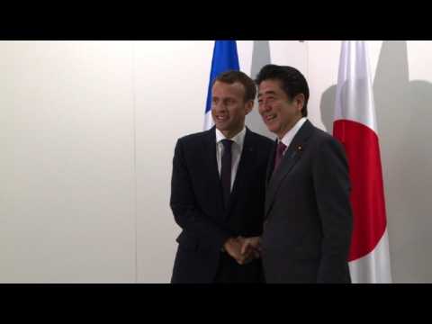 Emmanuel Macron meets Shinzo Abe in Saint-Petersburg