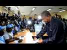 Angolan presidential candidate Joao Lourenço casts his vote