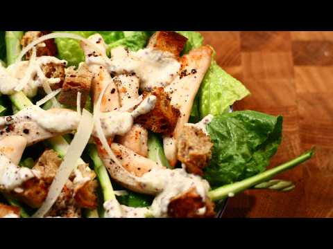Healthy chicken Caesar salad with Parmesan and mustard dressing