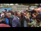 Kenya's President Kenyatta casts his vote in tight elections