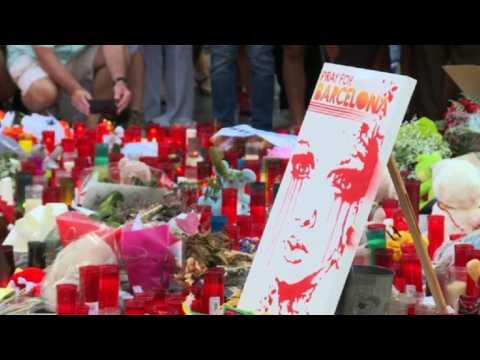 Flowers and candles spread on Barcelona's Ramblas for victims