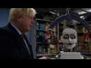 Britain's Johnson meets high-tech robots in Japan
