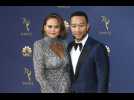 Chrissy Teigen and John Legend celebrated EGOT win with burgers