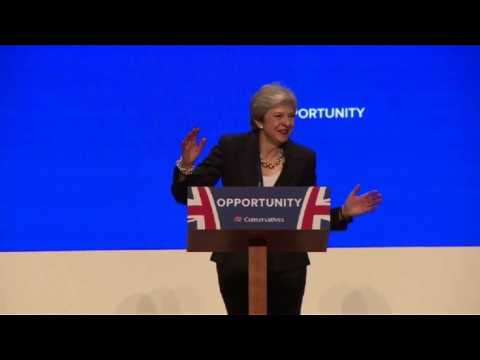 Britain's May shakes it up with 'Dancing Queen' boogie