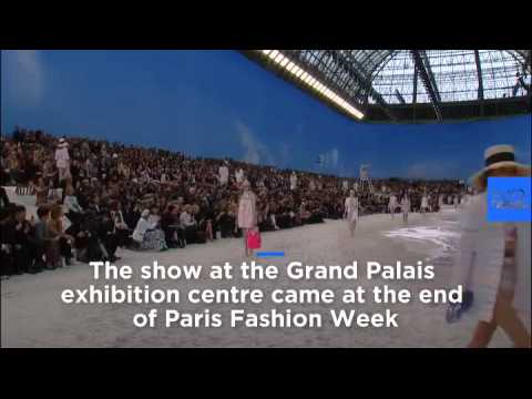 Catwalk turned into beach for Paris Fashion Week show