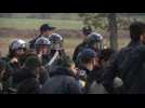 EU-bound migrants scuffle with Bosnian police near border