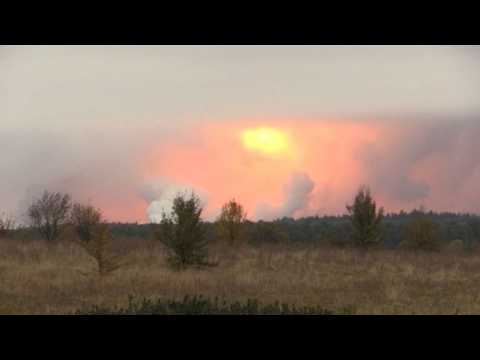 Explosions at Ukraine arms depot spark fire and evacuation