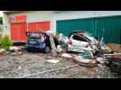 Destruction as strong earthquake and tsunami hit Indonesia