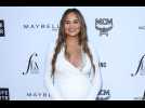 Chrissy Teigen thinks getting intimate with Cardi B and Rihanna would be 'ideal'