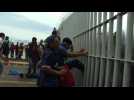 Migrants cross Guatemala-Mexico border after clashes