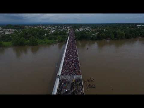 Drone images of migrants on the Guatemala-Mexico border bridge