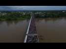 Drone images of migrants on the Guatemala-Mexico border bridge