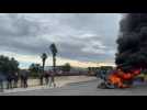 Perpignan : les agriculteurs bloquent le rond point de la route d'Espagne et font brûler des pneus