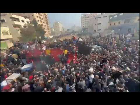 Thousands crowd around aid truck in Gaza City