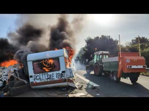 French farmers block A9 Narbonne toll booth in southern France