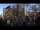 Pro-Palestinian demonstrators chant slogans outside Hague