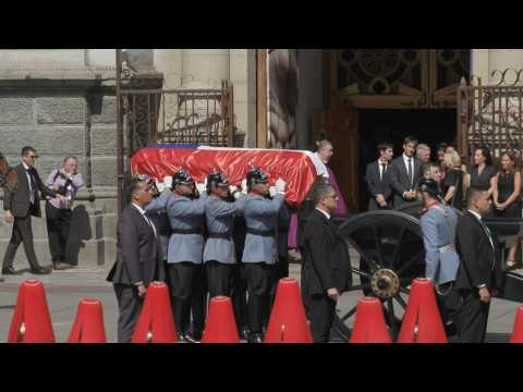 Coffin transporting body of Sebastian Pinera arrives at cathedral