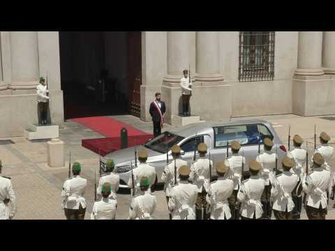 Coffin carrying ex-president Sebastian Pinera arrives at La Moneda palace