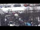 Police block crowd outside cemetery where Navalny is buried