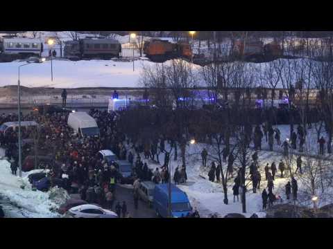 Crowds chant Navalny's name outside Moscow cemetery