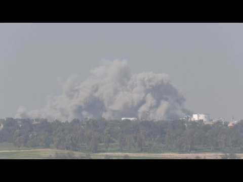Large plume of smoke rises over central Gaza, seen from Israel