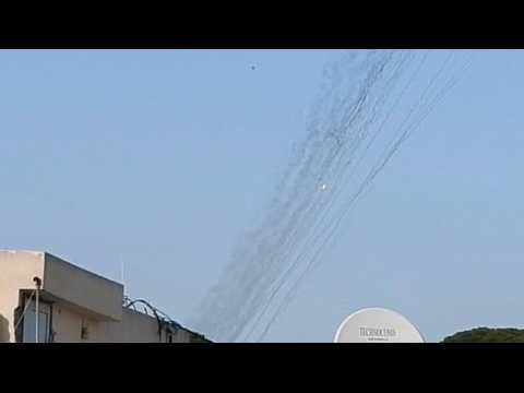 Hezbollah fires dozens of rockets towards Israeli base