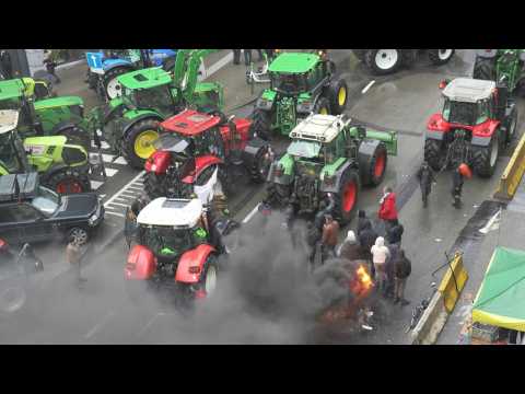 Brussels: Farmers block roads, light fires as ministers meet on farm rules