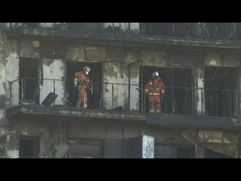 Spanish firefighters search for victims of blaze in Valencia flats