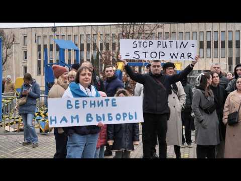 Anti-Putin protesters demonstrate outside Russian embassy in Riga