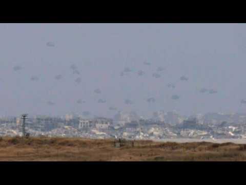 Aid packages airdropped into Gaza