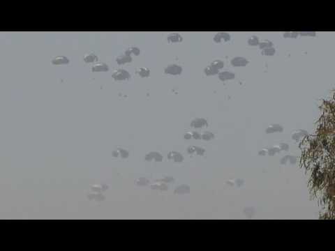 Aid airdropped into Gaza, seen from Israel