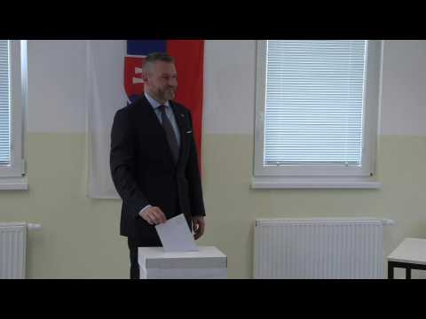 Slovakia's Peter Pellegrini votes in the second round of the presidential election