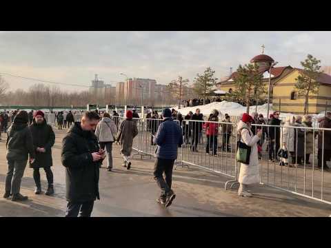 Russia: people queue at entrance of cemetery where Alexei Navalny lies buried