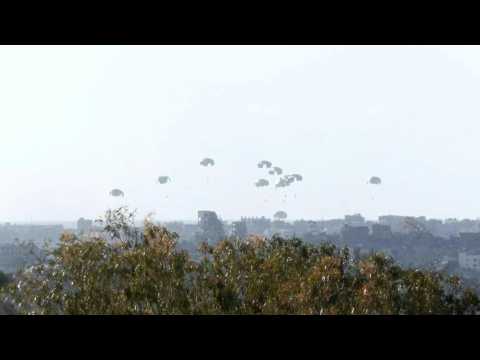 Plane parachutes Gaza aid
