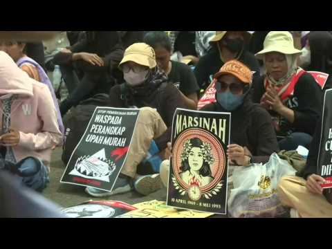 Indonesian women hold rally to mark International Women's Day