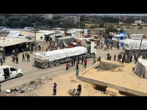 Aid trucks enter Gaza's Rafah