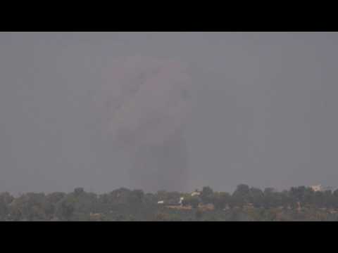 Smoke rises over central Gaza, seen from Israel