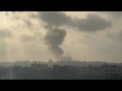 Plume of smoke rises over Gaza City