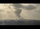Plume of smoke rises over Gaza City
