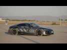 The new Audi e-tron GT prototype black camouflage wrap Handling course