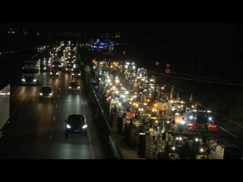 France : protesting farmers block a highway with tractors near wholesale food market