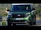 The new Ford Tourneo Courier in Bursting Green Driving Video