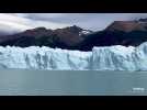 Un énorme iceberg émerge de l'eau devant le glacier Perito Moreno
