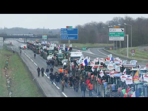 Farmers block A4 motorway on Paris outskirts