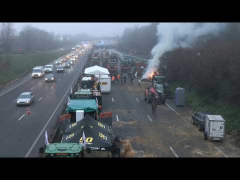 French farmers dismantle campsite on A6 motorway near Paris