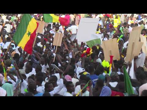 Senegalese supporters of anti-establishment candidate Bassirou Diomaye Faye attend final rally