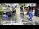 Heavy rain, flooding as Indonesia goes to the polls