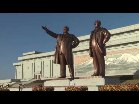 North Koreans lay flowers to mark Kim Jong Il's anniversary